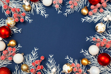 Merry Christmas and Happy New Year greeting card, frame, and banner. Holidays design. Noel and Feliz Navidad. Gifts and decorations, top view, flat lay. Text space, copy space winter background.