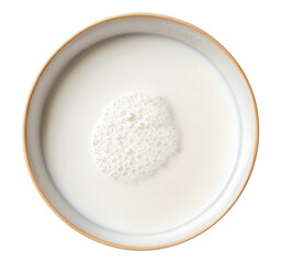 White milk with foam in round bowl viewed from above, isolated on transparent background