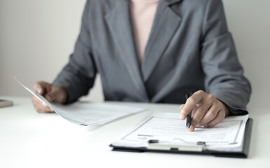 Business woman employer holding resume hiring recruit looking cv resume to hire candidates,...