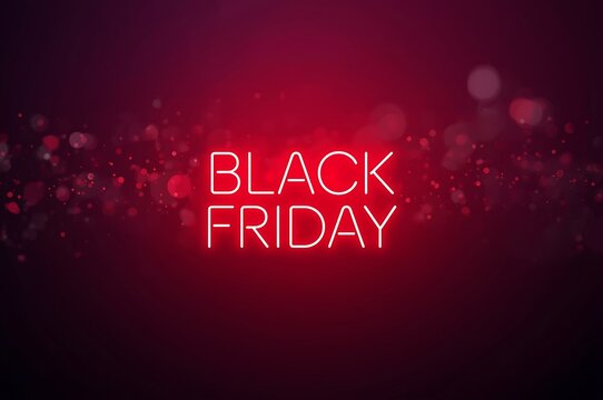 Glowing neon text black friday sale announcement with bokeh lights on dark red background for seasonal shopping promotions