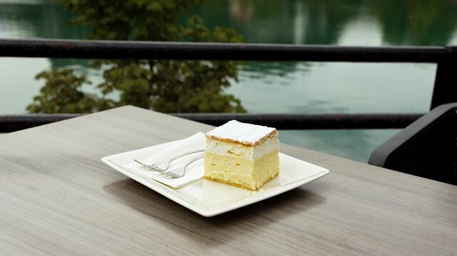 Plate Of Bled Cream Cake - Kremsnita On The Table At Kavarna Park Cafe. - closeup shot