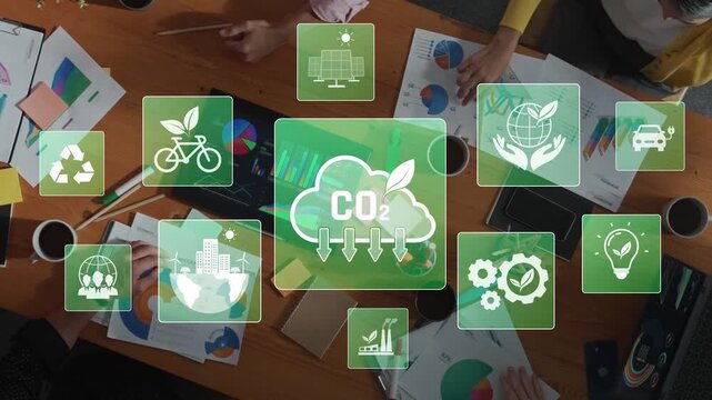 A diverse group of professionals engages in a collaborative meeting to discuss eco-friendly solutions. Carbon footprint icons overlay the table, enhancing their focus on sustainability. Raster