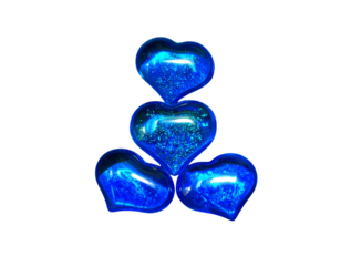 Firefly_Realistic soccer ball on a grassy field - Firefly_Three glossy blue hearts in various styles