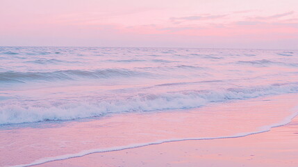 Sandy beach at dusk, with gentle waves rolling onto the shore and the sky painted in soft shades of pink and purple Valentine's day horizontal web banner, sale flyer, advert, greeting card