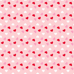 Seamless Pattern of Scattered Hearts on Pastel Pink Background