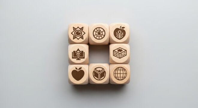 Nine Wooden Dice with Business Icons on Gray Background