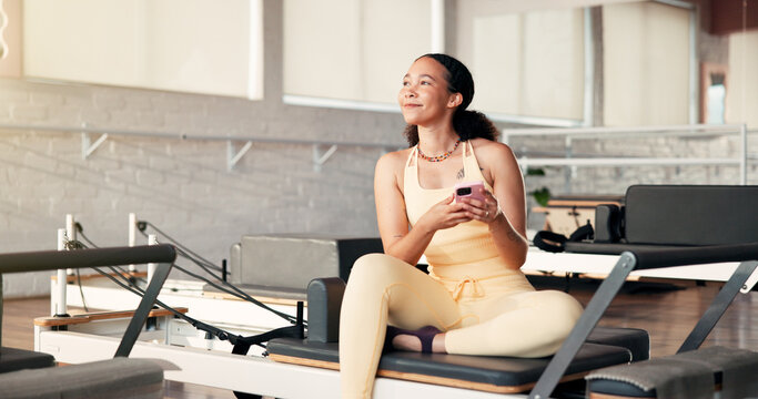 Thinking, smartphone and woman in studio, fitness and relax with digital app to track progress. Decision, connection and healthy person in wellness center, cellphone and social media with internet