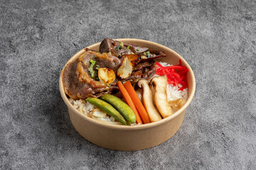 Japanese Beef Gyudon or Yakiniku Rice Bowl in Takeout Container