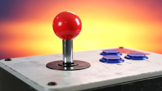 Close-up of a retro arcade joystick against a vibrant sunset background, evoking nostalgia - Powered by Adobe