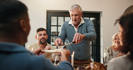 Thanksgiving, turkey and serve with old man in dining room for holiday season, family gathering or...