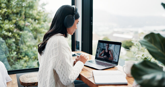Contact, laptop screen and video call with woman at window in home for remote work communication. Computer, headphones and virtual meeting with freelance employee in apartment for small business - Powered by Adobe