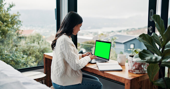 Laptop, remote work and woman with green screen in home office, social media marketing or campaign. Computer display, freelancer or person in bedroom for content creation, mockup space or reviews ads