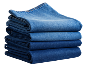 Folded denim fabric texture close-up, indigo blue cloth pattern isolated 