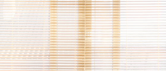 Window with wooden blinds in room