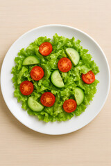 green salad with with tomato on white plate