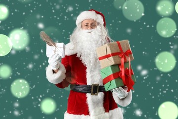 Santa Claus with letters and Christmas presents on green background