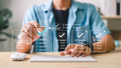 Businessman showing online document validation icon, quality assessment management With a...