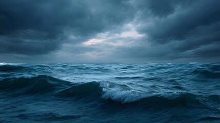 A stormy ocean with dark turbulent waves under a dramatic overcast sky