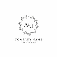 Elegant initial AU logo design with a hand drawn floral wreath.