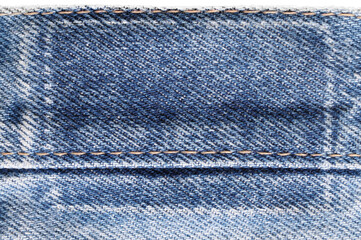 Denim blue jeans removed brand label tag patch traces, large detailed isolated blank empty textured horizontal background macro closeup, old worn garment farbric pattern backdrop