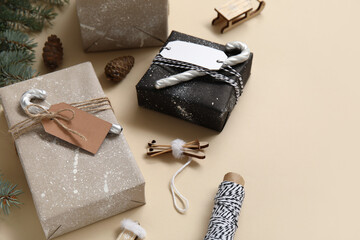 Composition with Christmas gifts and decor on color background