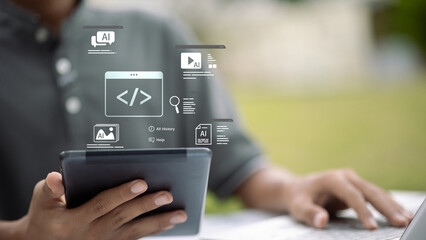 Person using tablet with AI programming and machine learning technology concept