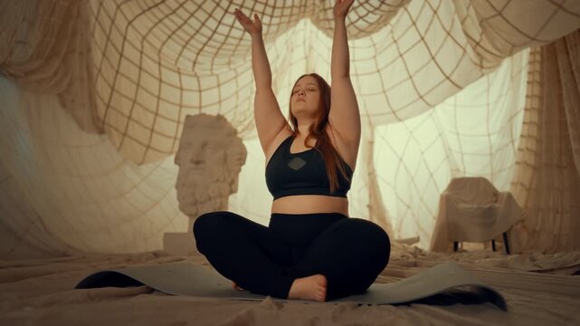 Overweight woman practicing yoga and meditation, keep calm and stay healthy. Sport and fitness for good body shape and mental health, breathing exercise, beautiful lady in sportswear, body neutrality