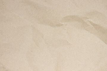 Old paper vintage texture surface for background. Recycle pale brown paper crumpled texture, Cream color recycled kraft paper texture blank with copy space for text.