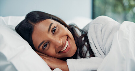 Break, portrait and smile of woman in bed for comfort, cozy or wellness on lazy weekend morning....