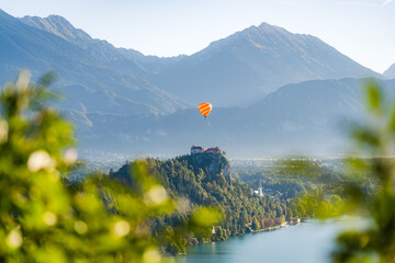Sunrise at Bled Castle with Hot Air Balloon Floating Above