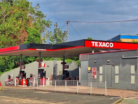 NEWCASTLE-UNDER-LYME, ENGLAND - JULY 13, 2025 : General view of Texaco fuel station during summertime in Higherland, Newcastle. Texaco is an American oil and gas brand owned by Chevron Corporation.