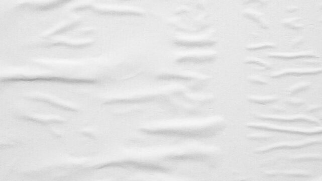 white crumpled and creased glued wrinkled paper poster texture background stop motion