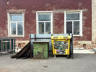 Plastic recycling bin in a small Russian town. Environmental care concept, handmade phone photo, selective focus, no AI