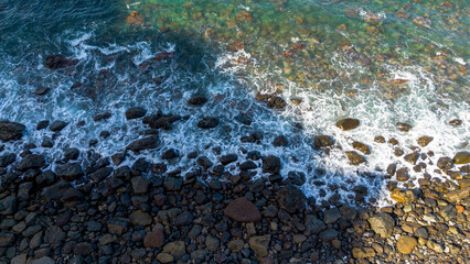Tenerife Island in the Atlantic Ocean, Canary Islands. Waves lap the coastline, aerial view.