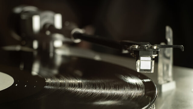 Vinyl record spinning on turntable player