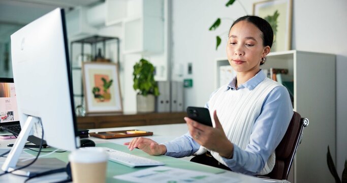 Businesswoman, computer or reading with phone in office, stock notification or client performance update. Pc, data analysis or financial analyst with mobile app to review investment, charts or graphs