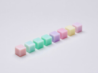 Fototapeta premium Minimalist Arrangement of Colored Jelly Cubes in Straight Line