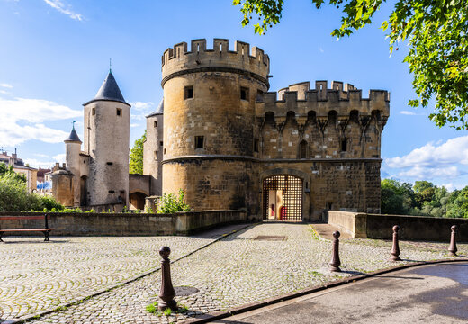 The Germans' Gate is a medieval bridge castle and city gate in Metz, France, with two round towers and two gun bastions, relic of the fortifications.