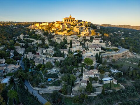 Fototapeta Gordes village drone aerial view at sunset in Provence, France