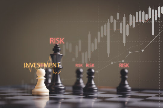 Chess pieces with investment and risk holographic chart representing financial strategy market analysis and decision making in business and investment planning