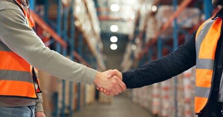 Supply chain, shaking hands and men in warehouse, agreement and logistics with partnership. Employees, bokeh and handshake in factory, distribution and onboarding with welcome, deal and introduction
