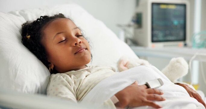 Healthcare, sleeping and patient or child in hospital bed for icu recovery, immune system rehabilitation and sickness. Medical, pediatrician treatment and rest with kid in clinic for monitor progress