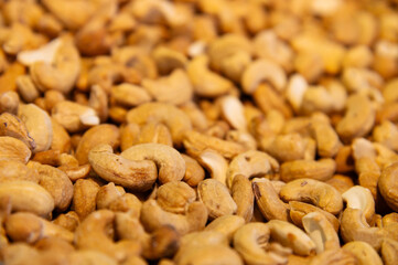 Roasted cashew nuts. Close-up. Background for snacks and nuts