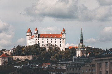 Obraz premium bratislava castle on a cloudy day and the bell tower in the foreground