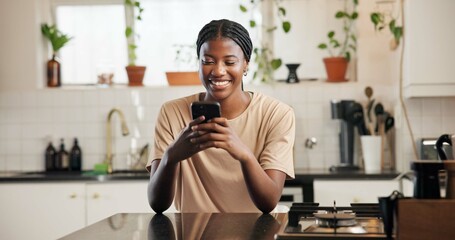 Phone, smile and text message with black woman in kitchen of home for social media browsing. App,...