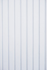 white garage door background with vertical paneling