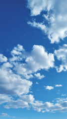 Fototapeta premium 【青空と白い雲】鮮やかなブルーに浮かぶ雲の背景
