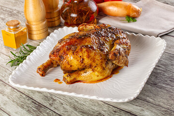Baked in oven whole chicken with spices