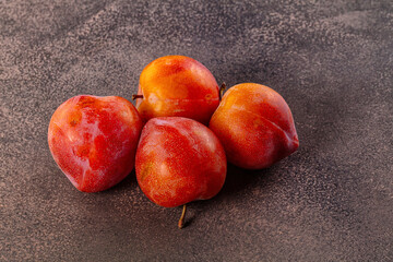 Ripe sweet juicy fresh purple plums