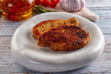 Breaded meat fillet escalope schnitzel